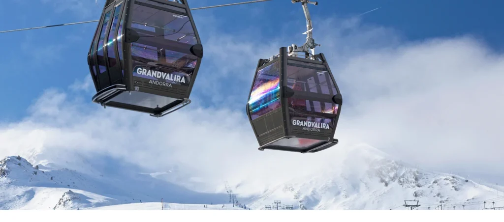 Grandvalira cable cars above snowy mountains in Andorra