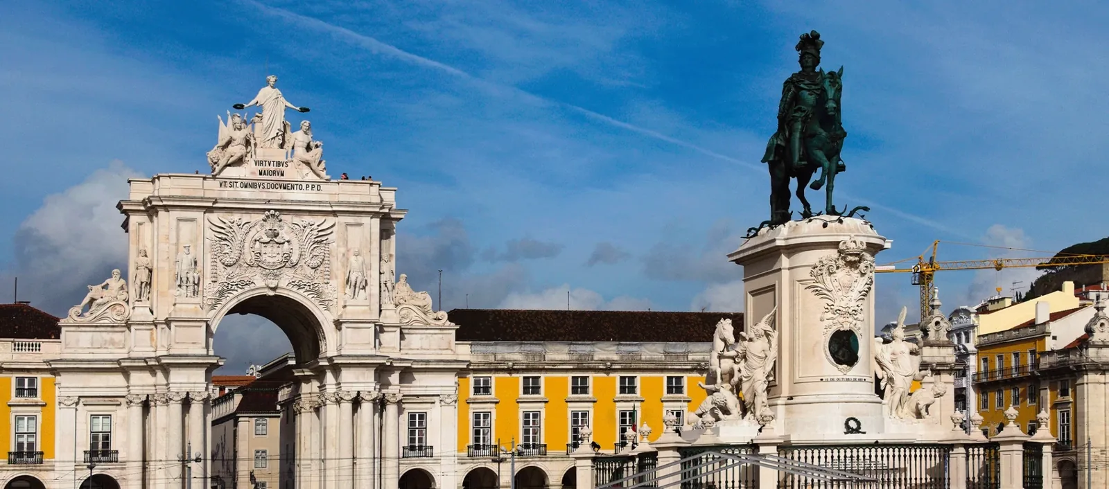 The Rua Augusta Arch and equestrian statue at Praça do Comércio in Lisbon